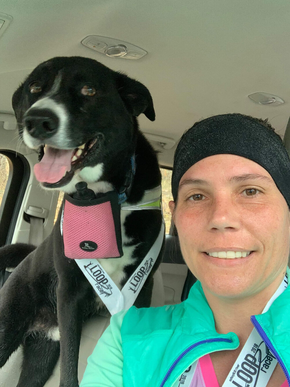 Cathy and her dog, Blue, after completing the Schuylkill River Loop Race, 2018